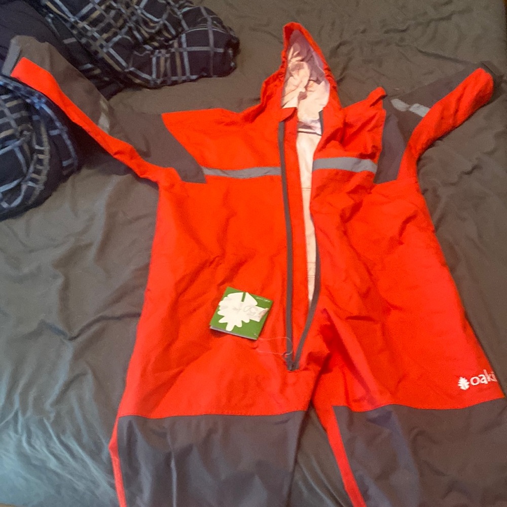 NWT. Oakies red rain suit kids 6/7. Bought and never wore.